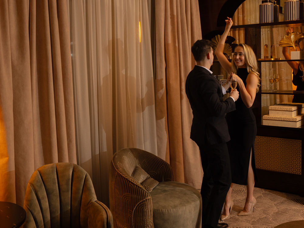 Couple dancing in bedroom